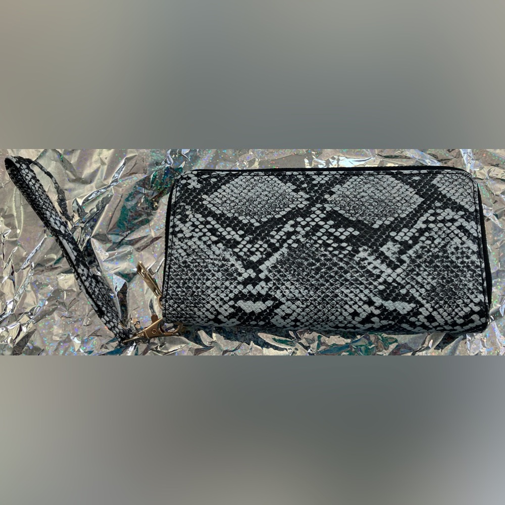 Faux snakeskin-patterned wristlet wallet